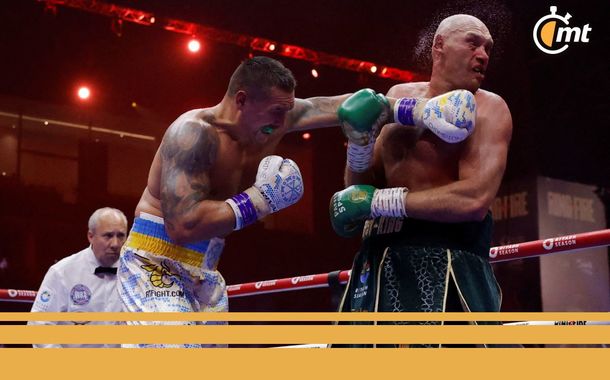 Usyk golpea a Fury en la primera pelea (Reuters)