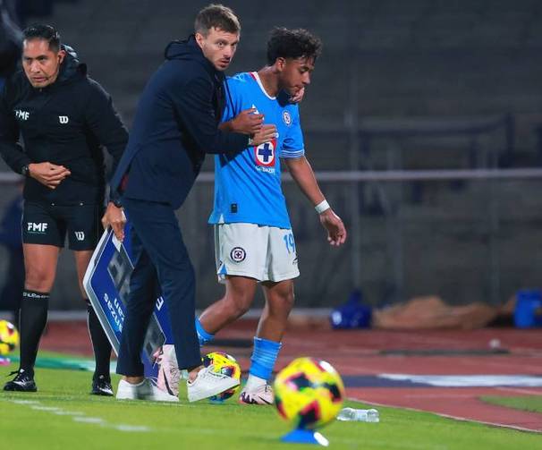 Anselmi y Amaury Morales en el juego ante Atlas (Imago7)