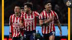 Alan Pulido celebra con sus compañeros (Imago7)