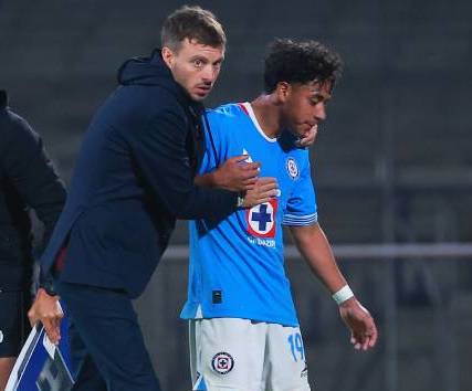 Anselmi y Amaury Morales en el juego ante Atlas (Imago7)