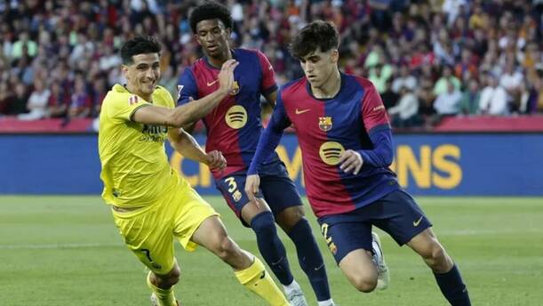 Barcelona y Villarreal durante un juego de la temporada pasada (EFE)