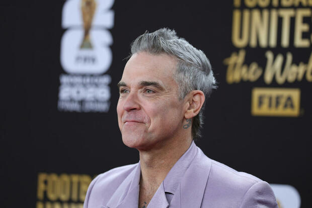 El cantante británico fue uno de los intérpretes de la canción oficial. (Foto: EFE)