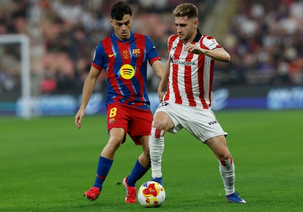 Pedri y Robert Navarro (Reuters)