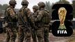 El servicio militar es obligatorio también para futbolistas. (Foto: ChatGPT/ logo FIFA)